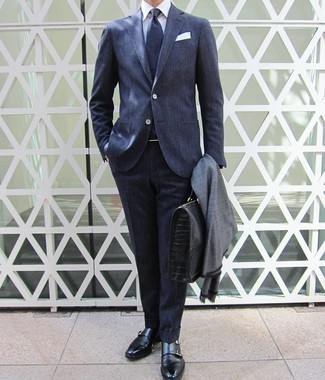 Briefcase Outfits: If you're a fan of laid-back style, why not wear a navy suit with a briefcase? Finishing with a pair of black leather double monks is an effective way to bring some extra flair to this ensemble.