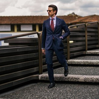 Navy Sunglasses Outfits For Men: This combo of a navy suit and navy sunglasses is indisputable proof that a simple casual look can still be really interesting. For something more on the dressier side to complete this outfit, complement this ensemble with black leather double monks.