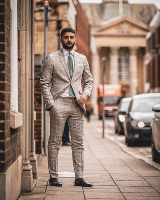 Mint Print Tie Outfits For Men: We love how this combo of a tan check suit and a mint print tie instantly makes any gent look polished and sharp. Dial down your outfit by finishing with a pair of dark brown leather double monks.