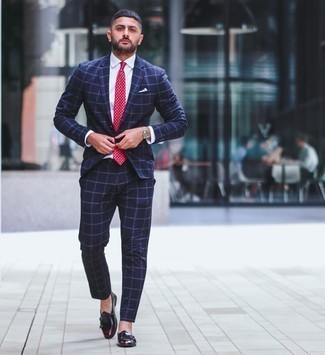 Red Paisley Tie Outfits For Men: To look like a perfect gent at all times, team a navy check suit with a red paisley tie. A trendy pair of burgundy leather double monks is an easy way to add a hint of stylish effortlessness to this outfit.