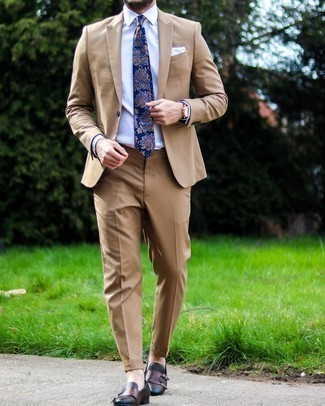 Red Watch Outfits For Men: Opt for a tan suit and a red watch for a casual kind of refinement. Go ahead and introduce dark brown leather double monks to the equation for an extra dose of elegance.