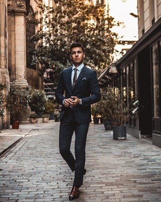Navy Plaid Suit Outfits: You'll be surprised at how easy it is to pull together this sophisticated ensemble. Just a navy plaid suit worn with a light blue dress shirt. Introduce dark brown leather double monks to the equation and the whole getup will come together really well.