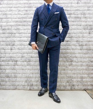 Blue Tie Outfits For Men: Marrying a navy vertical striped suit and a blue tie is a guaranteed way to inject your wardrobe with some rugged elegance. Let your outfit coordination savvy truly shine by completing your outfit with black leather double monks.