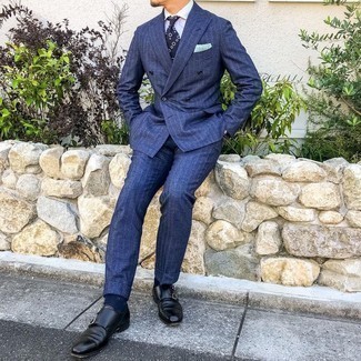 Blue Suit Outfits: This elegant combination of a blue suit and a white dress shirt is undoubtedly a statement-maker. Why not complete this outfit with black leather double monks for a more casual touch?