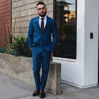 Red Check Tie Outfits For Men: Pairing a navy suit and a red check tie is a guaranteed way to infuse your current outfit choices with some rugged sophistication. To add a more casual finish to your look, add dark brown leather double monks to the mix.