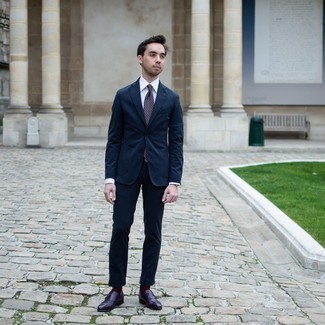Purple Polka Dot Tie Outfits For Men: This is solid proof that a navy suit and a purple polka dot tie are amazing when worn together in a classy look for a modern man. And if you need to effortlessly dial down this outfit with footwear, why not add a pair of dark purple leather double monks to this outfit?