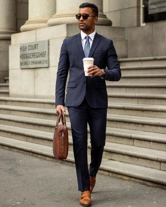 Light Blue Tie Outfits For Men: Consider wearing a navy suit and a light blue tie if you're aiming for a proper, stylish look. Add a pair of tobacco leather double monks to the mix to inject a sense of stylish casualness into your look.
