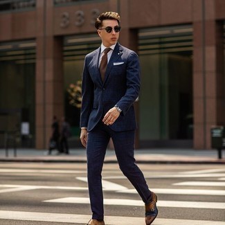 Dark Brown Socks Outfits For Men: Extremely dapper, this casual combination of a navy suit and dark brown socks provides variety. Go the extra mile and change up your outfit by rocking brown leather double monks.