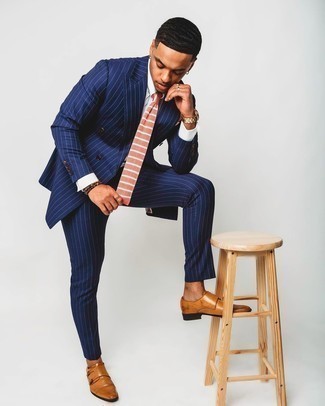Navy Vertical Striped Suit Outfits: Combining a navy vertical striped suit and a white dress shirt is a guaranteed way to inject your day-to-day collection with some masculine refinement. A pair of tobacco leather double monks looks perfect here.