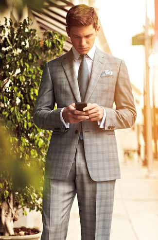 Grey Plaid Dress Pants Outfits For Men: We love the way this combo of a grey plaid suit and grey plaid dress pants instantly makes you look sharp and elegant.