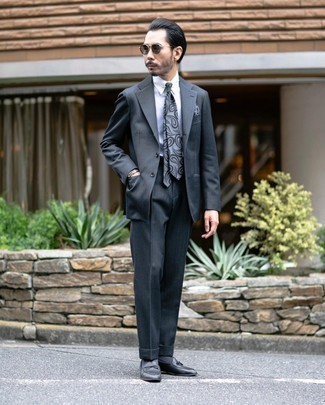 Black and White Polka Dot Pocket Square Outfits: If it's comfort and functionality that you appreciate in menswear, team a charcoal suit with a black and white polka dot pocket square. On the shoe front, go for something on the dressier end of the spectrum by sporting a pair of black leather loafers.