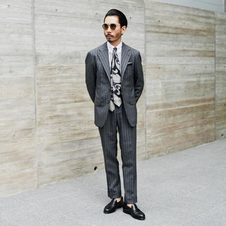 Charcoal Sunglasses Outfits For Men: This laid-back pairing of a charcoal vertical striped suit and charcoal sunglasses is extremely easy to pull together without a second thought, helping you look seriously stylish and prepared for anything without spending too much time rummaging through your closet. With shoes, you can follow a classier route with black leather loafers.