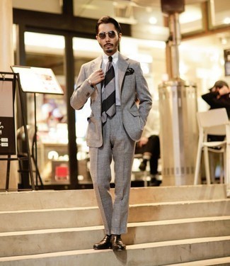 Black Horizontal Striped Tie Outfits For Men: Consider wearing a grey suit and a black horizontal striped tie for a proper elegant getup. Rounding off with black leather loafers is a fail-safe way to add a carefree vibe to this look.