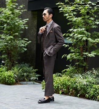 Dark Brown Print Tie Outfits For Men: A dark brown plaid suit and a dark brown print tie are essential in a versatile man's wardrobe. For something more on the casually cool end to finish off this look, introduce a pair of black leather loafers to the mix.