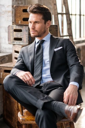 Charcoal Vertical Striped Tie Outfits For Men: Pairing a charcoal suit and a charcoal vertical striped tie will hallmark your styling expertise. A pair of brown leather loafers effortlessly turns up the appeal of this outfit.