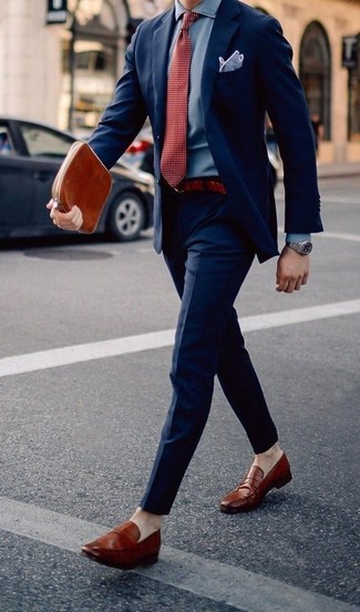 Red Woven Leather Belt Outfits For Men: If you're in search of a laid-back yet sharp ensemble, try pairing a navy suit with a red woven leather belt. You know how to bring a touch of class to this outfit: tobacco leather loafers.