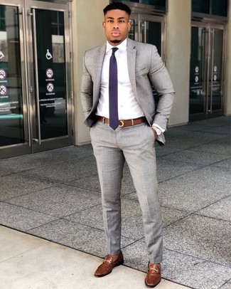 Grey Suit with Brown Leather Belt Outfits: A grey suit and a brown leather belt are an easy way to introduce some cool into your current lineup. A pair of brown leather loafers effortlessly revs up the fashion factor of your getup.