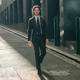 Charcoal Suit with Loafers Outfits: Pairing a charcoal suit and a white dress shirt will be a good exhibition of your styling skills. Loafers are an effective way to give a sense of stylish effortlessness to your ensemble.