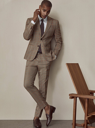 Brown Plaid Suit Outfits: Marrying a brown plaid suit and a white dress shirt will create a confident, rugged silhouette. Our favorite of a ton of ways to complement this look is with a pair of dark brown leather loafers.