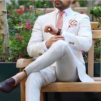 white suit red shoes
