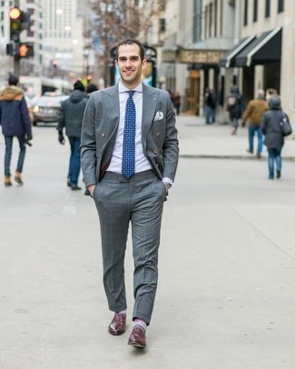 Blue Polka Dot Tie Outfits For Men: A grey check suit and a blue polka dot tie are powerful sartorial weapons in any guy's wardrobe. Burgundy leather loafers are an effective way to inject an element of stylish effortlessness into this getup.