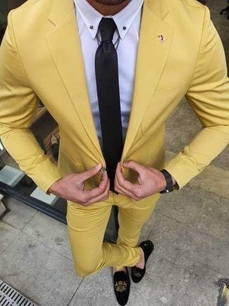 Mustard Suit Outfits: When it comes to timeless sophisticated style, this combo of a mustard suit and a white dress shirt doesn't disappoint. For a more laid-back twist, why not choose a pair of black embroidered velvet loafers?