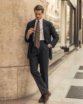 Brown Suede Loafers Outfits For Men: This combination of a charcoal suit and a white dress shirt will add polished essence to your outfit. Finishing with a pair of brown suede loafers is a simple way to infuse an easy-going feel into this look.