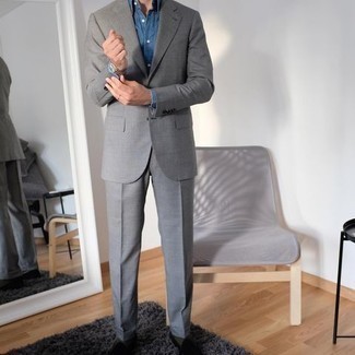 Black Velvet Loafers Outfits For Men: Teaming a grey suit with a blue chambray dress shirt is an amazing idea for a classic and polished ensemble. To give your overall ensemble a more casual finish, grab a pair of black velvet loafers.