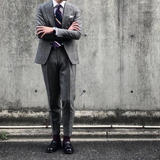 Grey Plaid Suit Outfits: This polished combination of a grey plaid suit and a white and navy vertical striped dress shirt is a favored choice among the dapper chaps. We adore how this whole outfit comes together thanks to a pair of black leather loafers.