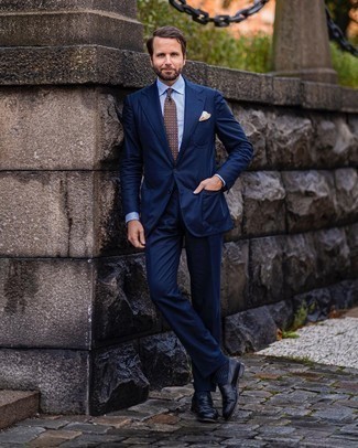 Tobacco Polka Dot Tie Outfits For Men: We're loving how this pairing of a navy suit and a tobacco polka dot tie immediately makes any man look sophisticated and smart. If you need to easily dial down this outfit with one item, complement your look with a pair of black leather loafers.
