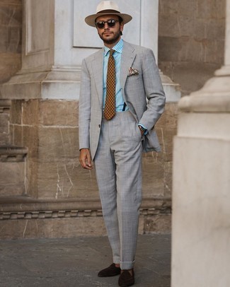 Tobacco Paisley Tie Outfits For Men: A grey suit and a tobacco paisley tie are among the unshakeable foundations of any well-edited menswear collection. To bring a dash of stylish casualness to this look, complement your outfit with dark brown suede loafers.