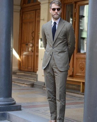 Teal Suit Dressy Warm Weather Outfits: A teal suit looks especially refined when teamed with a white dress shirt. Introduce a pair of tan suede loafers to the equation to immediately ramp up the cool of this ensemble.