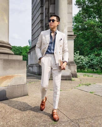 Blue Vertical Striped Dress Shirt Outfits For Men: A blue vertical striped dress shirt and a white suit are surely worth adding to your list of closet essentials. On the shoe front, this ensemble pairs nicely with tobacco leather loafers.