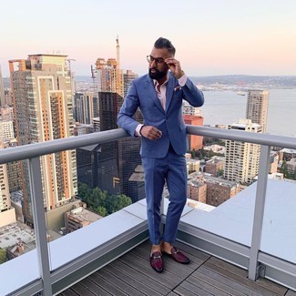 Blue Suit Outfits: One of our favorite ways to style such a hard-working menswear piece as a blue suit is to wear it with a pink dress shirt. Serve a little outfit-mixing magic by finishing with a pair of burgundy leather loafers.