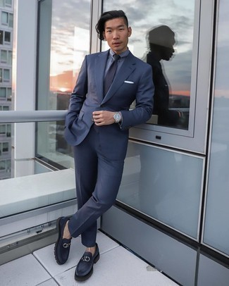 Navy Suit Outfits: For dapper style with a fashionable spin, wear a navy suit and a blue dress shirt. Kick up this ensemble by finishing off with navy embellished suede loafers.