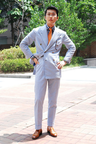Orange Polka Dot Tie Outfits For Men: Nail the classic look with a light blue vertical striped seersucker suit and an orange polka dot tie. Feel uninspired with this getup? Let tobacco leather loafers mix things up a bit.