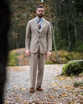 Tan Wool Suit Outfits: Combining a tan wool suit and a white and blue vertical striped dress shirt is a guaranteed way to breathe manly elegance into your styling arsenal. Our favorite of a countless number of ways to finish off this outfit is brown suede loafers.