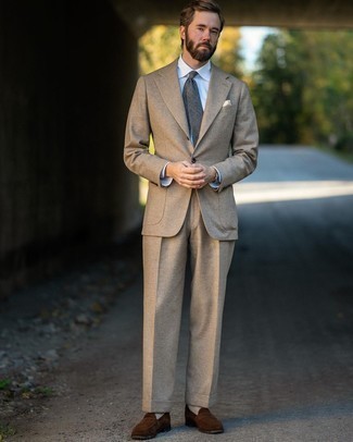 Grey Plaid Tie Outfits For Men: Undeniable proof that a tan suit and a grey plaid tie are amazing when paired together in an elegant look for a modern guy. If you need to immediately dial down your outfit with footwear, why not introduce a pair of brown suede loafers to this look?