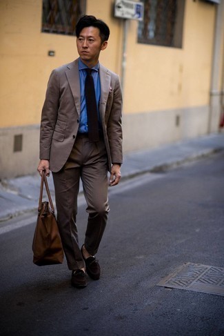 Tobacco Tie Outfits For Men: You're looking at the undeniable proof that a brown vertical striped suit and a tobacco tie are awesome when worn together in a refined getup for a modern man. And if you wish to easily dial down this outfit with a pair of shoes, introduce a pair of dark brown suede loafers to the mix.