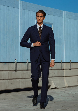 Brown Polka Dot Tie Outfits For Men: Marrying a navy suit and a brown polka dot tie is a surefire way to breathe a sophisticated touch into your day-to-day styling rotation. Serve a little outfit-mixing magic by slipping into a pair of black leather loafers.