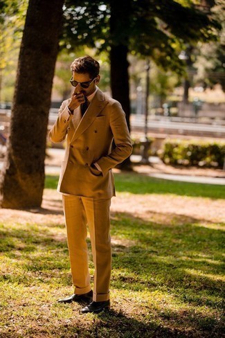 Dark Brown Suit Outfits: Consider teaming a dark brown suit with a beige vertical striped dress shirt - this look is bound to make heads turn. Introduce dark brown leather loafers to the equation and the whole look will come together.