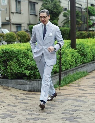 Light Blue Suit Outfits: This combo of a light blue suit and a white dress shirt couldn't possibly come across as anything other than ridiculously stylish and sophisticated. Add a pair of dark brown leather loafers to the mix to keep the outfit fresh.