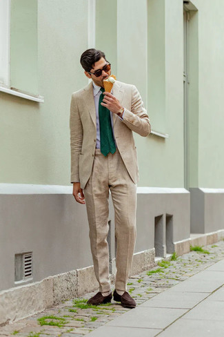 Beige Suit Outfits: A beige suit and a light blue dress shirt? Be sure, this menswear style will turn every head around. Let your outfit coordination prowess truly shine by completing your outfit with dark brown suede loafers.