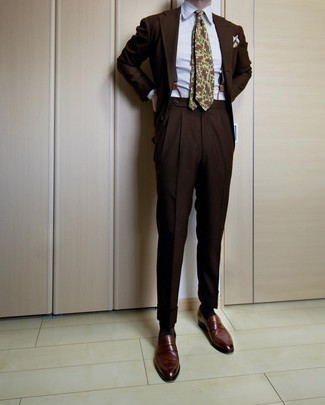 Yellow Paisley Tie Outfits For Men: Make a dark brown suit and a yellow paisley tie your outfit choice for seriously stylish attire. Complete this outfit with a pair of dark brown leather loafers to infuse an air of stylish effortlessness into this outfit.