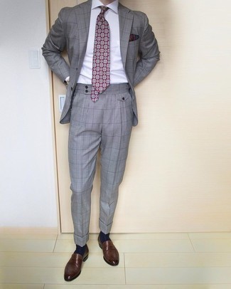 Grey Plaid Suit Outfits: Consider wearing a grey plaid suit and a white dress shirt to be the picture of refined men's fashion. Let your sartorial savvy truly shine by completing your outfit with dark brown leather loafers.