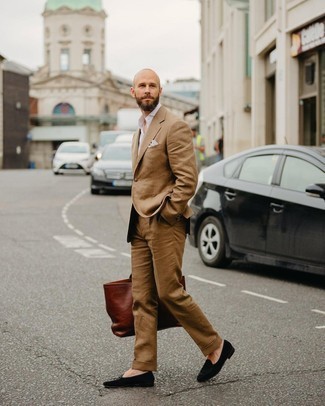 Dark Brown Leather Tote Bag Outfits For Men: Go for an off-duty outfit in a brown suit and a dark brown leather tote bag. Introduce black velvet loafers to this ensemble to effortlessly amp up the classy factor of your outfit.