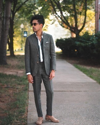 Tan Suede Loafers Outfits For Men: Make a charcoal suit and a white and black vertical striped dress shirt your outfit choice for a neat classy look. This getup is finished off nicely with tan suede loafers.