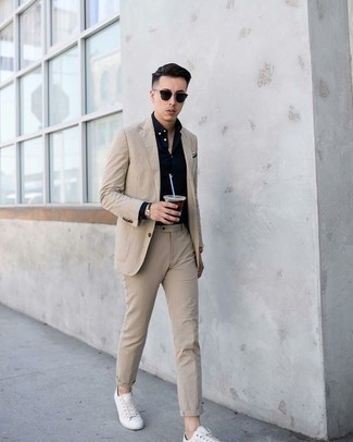 Beige Watch Outfits For Men: A beige suit and a beige watch are a combination that every fashion-forward gent should have in his menswear collection. Introduce white canvas low top sneakers to the mix and ta-da: your getup is complete.