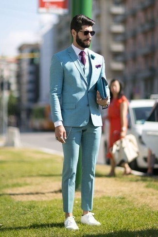 Purple Pocket Square Outfits: A light blue suit and a purple pocket square are stylish menswear pieces, without which our wardrobes would surely be incomplete. For maximum effect, complement your outfit with white leather low top sneakers.