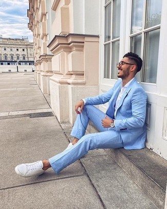 White and Brown Low Top Sneakers with Dress Shirt Dressy Outfits For Men: A dress shirt looks especially polished when combined with a light blue suit. Our favorite of a ton of ways to round off this ensemble is white and brown low top sneakers.